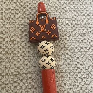 Louis Vuitton Brown and Red Bag Charm